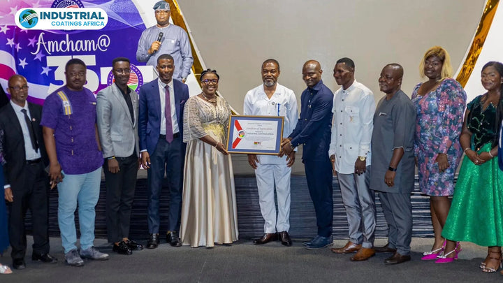 Industrial Coatings Africa team receiving a Certificate of Appreciation at the AMCHAM Ghana 35th Anniversary Thanksgiving Dinner
