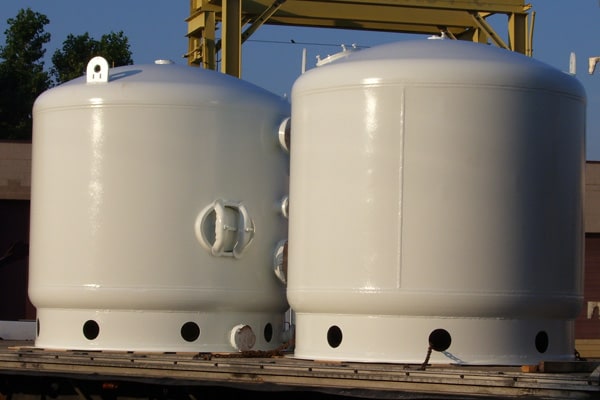 Carbon steel fabrication for bridges and steel infrastructure — coating systems